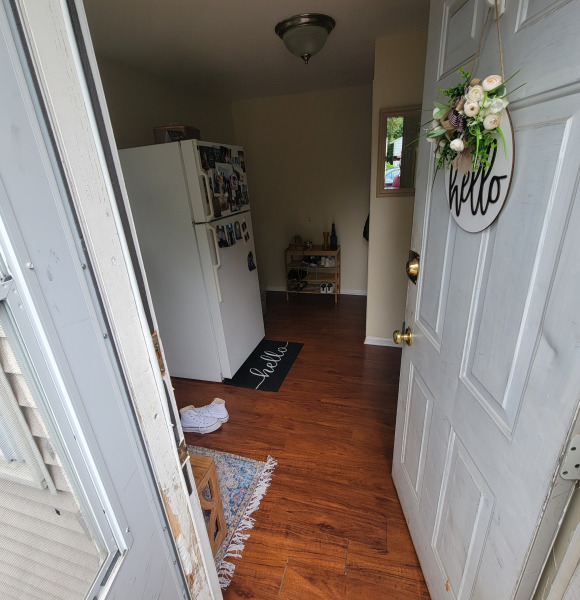Back door entry into West unit's mud room